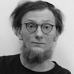 Simon with black tshirt, beard and glasses